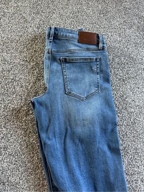 Classic Boot Cut Jeans in Medium Blue - Subtle Fade